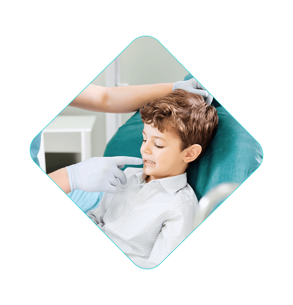 child having a doctor check on their teeth for their dental procedure