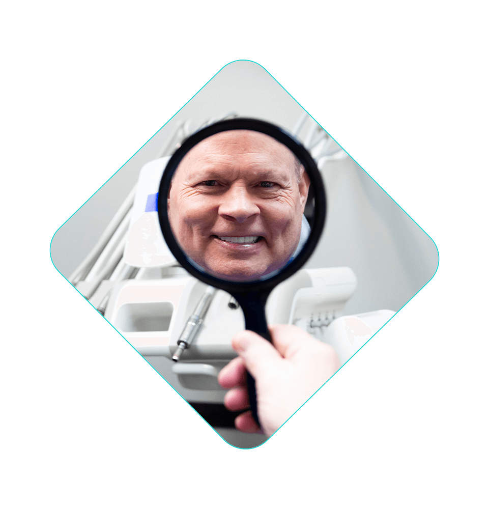 close up of patient smiling brightly after their dental procedure