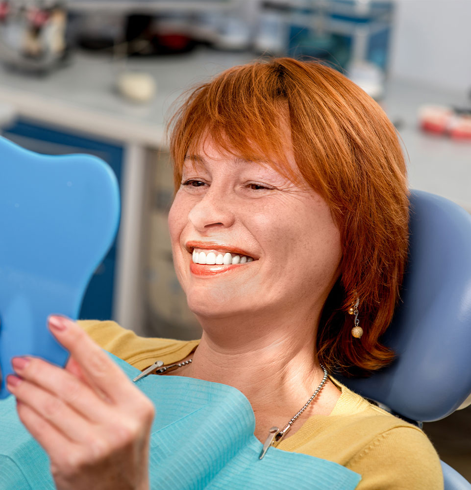 Senior woman in the dental office.