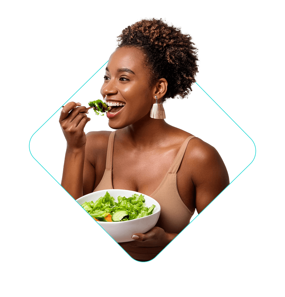 close up of female enjoying and eating their salad